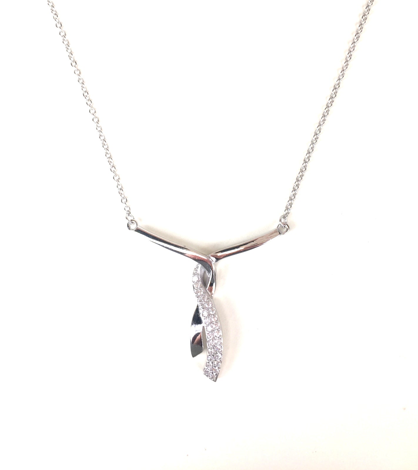 SPARKLING TWIST PAVE CZ STERLING SILVER NECKLACE